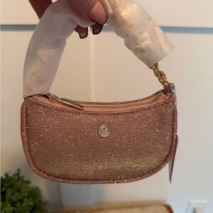 lululemon athletica light mauve clutch wristlet